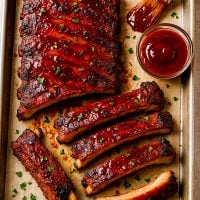 Make saucy, fall-off-the-bone BBQ ribs right in your oven! These tender, juicy ribs are ready fast — no smoker needed.