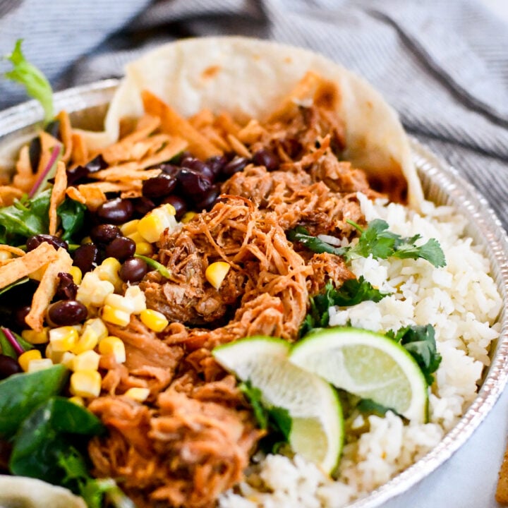 Make the famous Café Rio sweet pork salad at home—tender pork, cilantro-lime rice, beans, tomatillo-ranch, and all the crunchy toppings.
