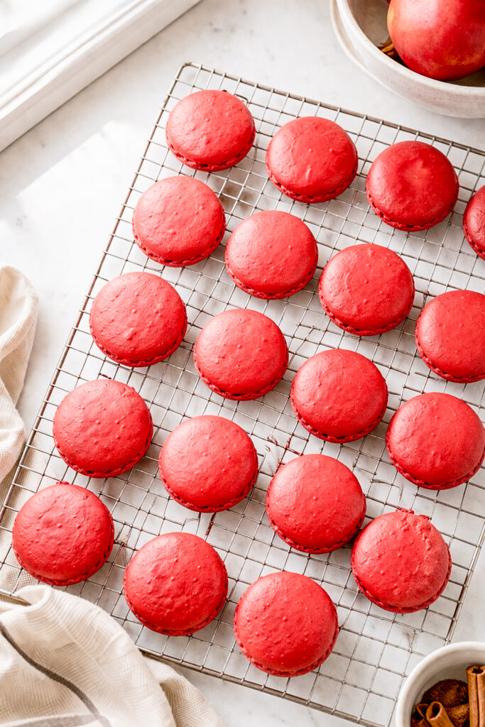 Looking for the ultimate fall macaron recipe? These apple spice macarons have delicate Italian macaron shells and a rich apple cinnamon buttercream filling that tastes like autumn in every bite.