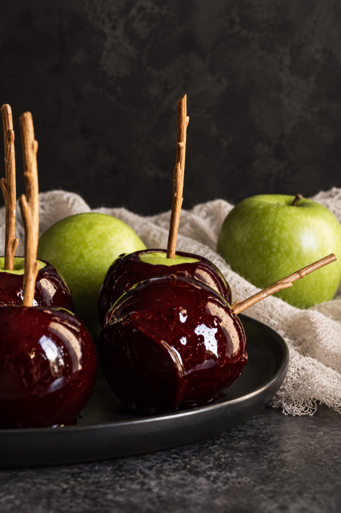 Black Candy Apples with a Hard Candy Shell