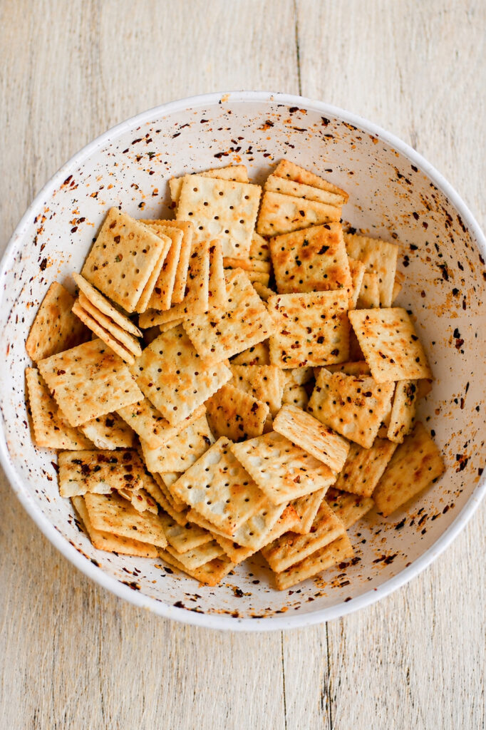 Looking for an easy party snack? These spicy ranch fire crackers are bold, crunchy, and totally addictive. No baking required!