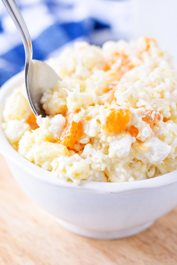 Looking for an easy make-ahead dessert salad? This Frog Eye Salad recipe is fluffy, creamy, fruity, and perfect for Easter, Thanksgiving, Christmas, and potlucks.